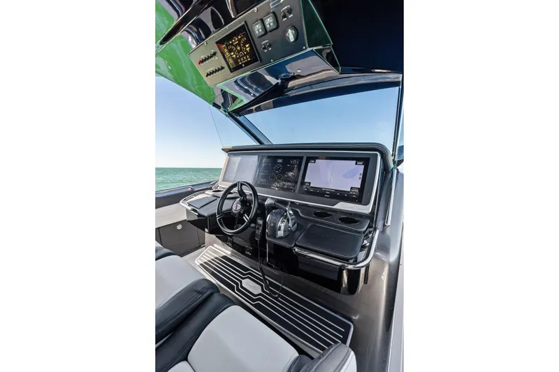 Slide: The Image of Cockpit of 2020 Cigarette 42' Auroris boat with modern navigation displays. - 22
