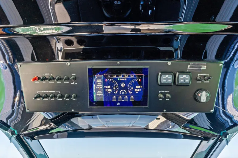 Slide: The Image of Control panel of 2020 Cigarette 42' Auroris boat with digital display and switches. - 23