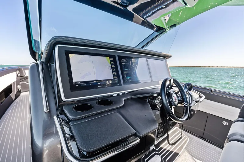 Slide: The Image of Helm of 2020 Cigarette 42' Auroris boat with advanced navigation system. - 26