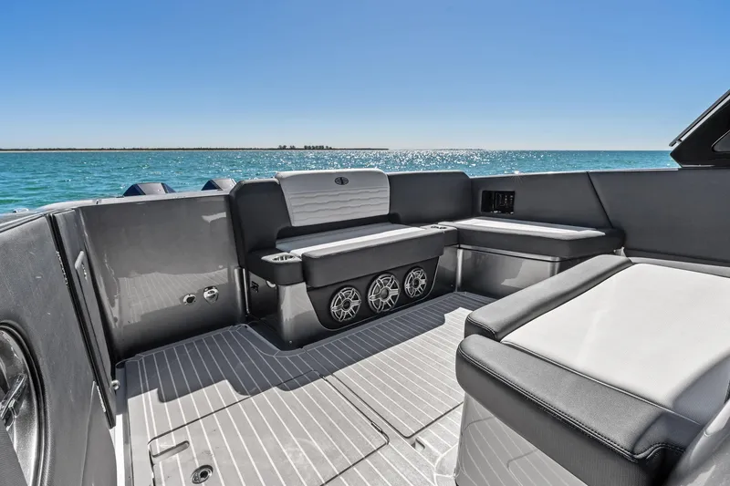 Slide: The Image of 2020 Cigarette 42' Auroris boat interior with sleek seating and ocean view. - 28