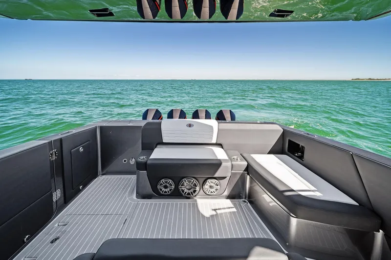 Slide: The Image of 2020 Cigarette 42' Auroris boat interior with seating, ocean view, and sleek design. - 39