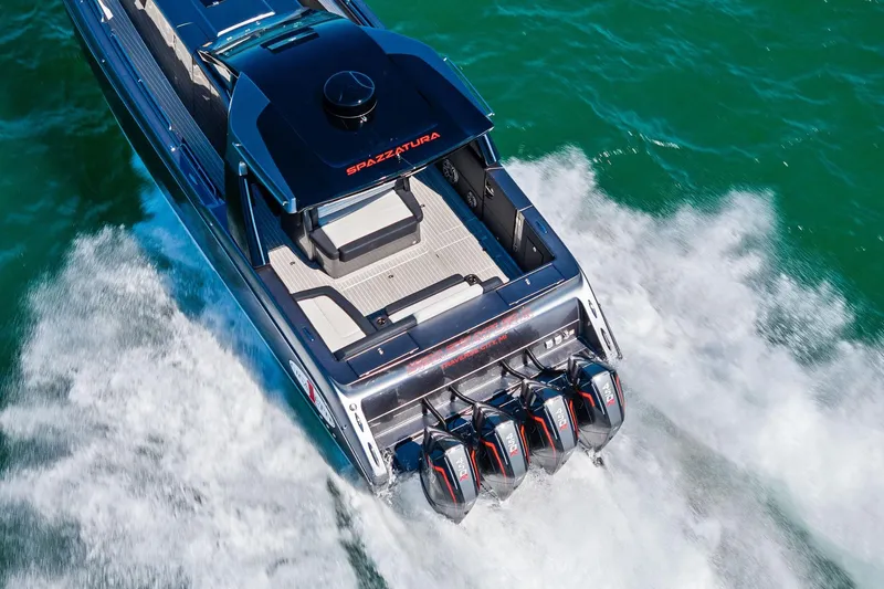 Slide: The Image of 2020 Cigarette 42' Auroris speedboat cruising on water with powerful engines. - 7