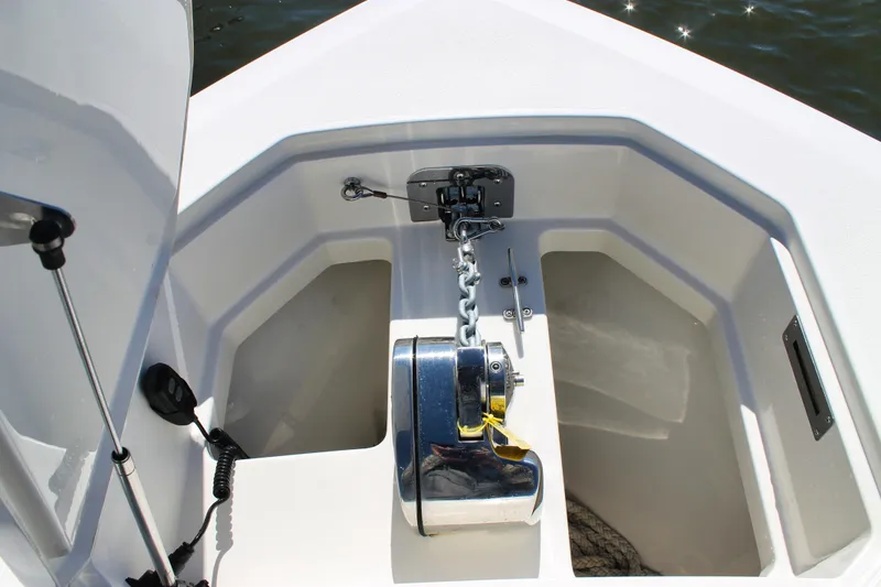 Slide: The Image of 2024 Sailfish 360 CC boat anchor system with chain and storage compartments. - 37