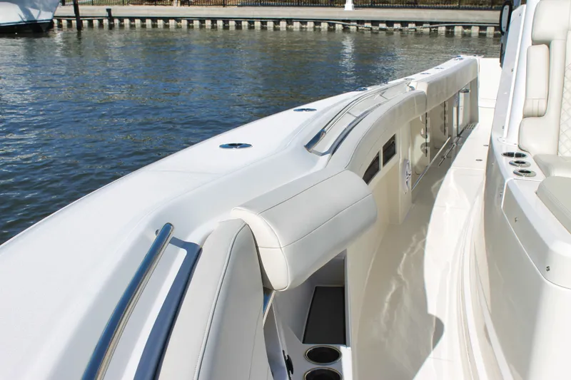 Slide: The Image of 2024 Sailfish 360 CC boat interior with sleek design and waterfront view. - 4