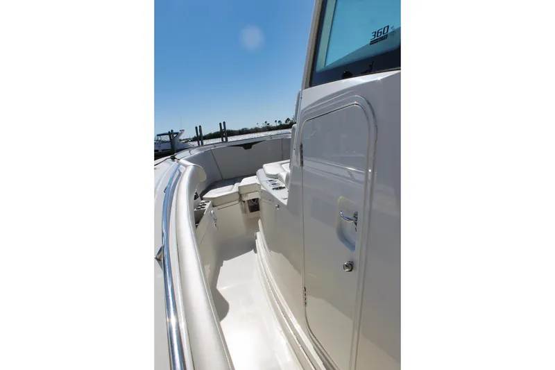 Slide: The Image of 2024 Sailfish 360 CC boat deck with sleek design and modern features. - 8