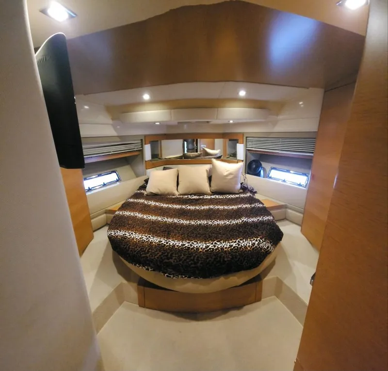Slide: The Image of Luxurious bedroom interior of 2013 Azimut 45 Flybridge yacht with plush bedding. - 21