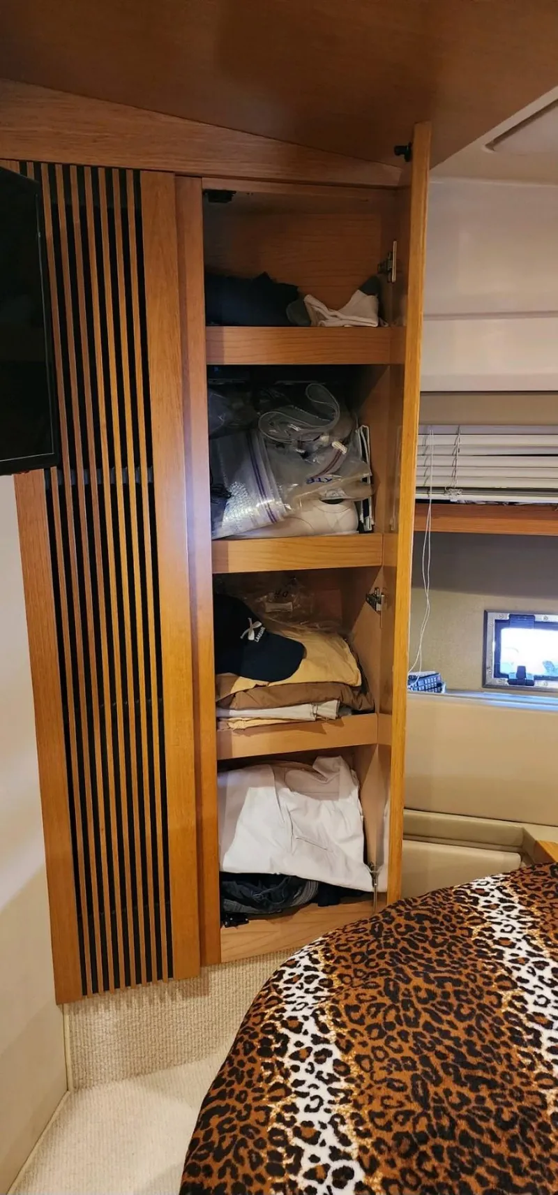 Slide: The Image of Wooden closet with shelves in 2013 Azimut 45 Flybridge yacht bedroom. - 23