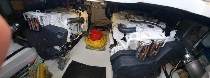 Slide: The Image of Engine room of a 2013 Azimut 45 Flybridge yacht with visible machinery and equipment. - 28