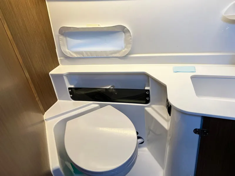 Slide: The Image of 2021 Beneteau Antares 9 bathroom with modern fixtures and compact design. - 24