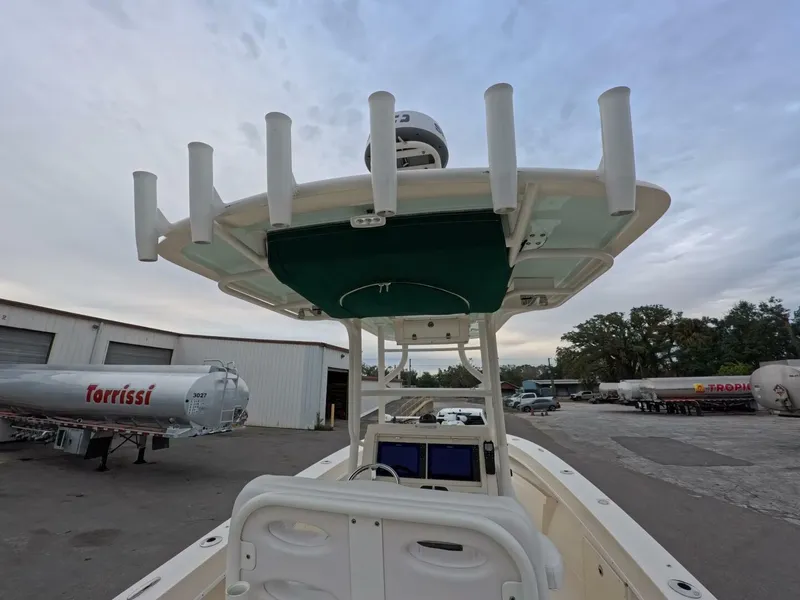 Slide: The Image of JL Audio MediaMaster 105 on 2019 Young Boats 27, displaying FM radio station 99.5. - 13