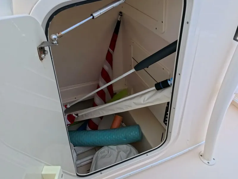 Slide: The Image of 2019 Young Boats 27 with Minn Kota trolling motor on open water. - 20