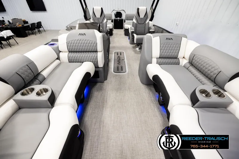 Slide: The Image of Luxurious interior of 2026 Avalon CAT QLS boat with plush seating and cup holders. - 13