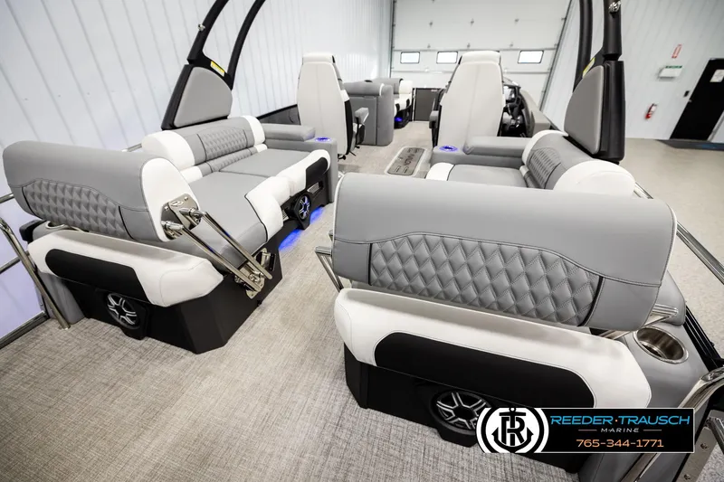 Slide: The Image of Luxurious interior of 2026 Avalon CAT QLS pontoon boat with plush seating and modern design. - 29