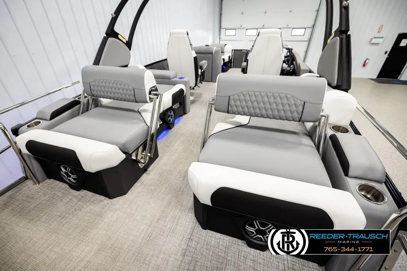 Slide: The Image of Luxurious interior of 2026 Avalon CAT QLS boat with modern seating and cup holders. - 30