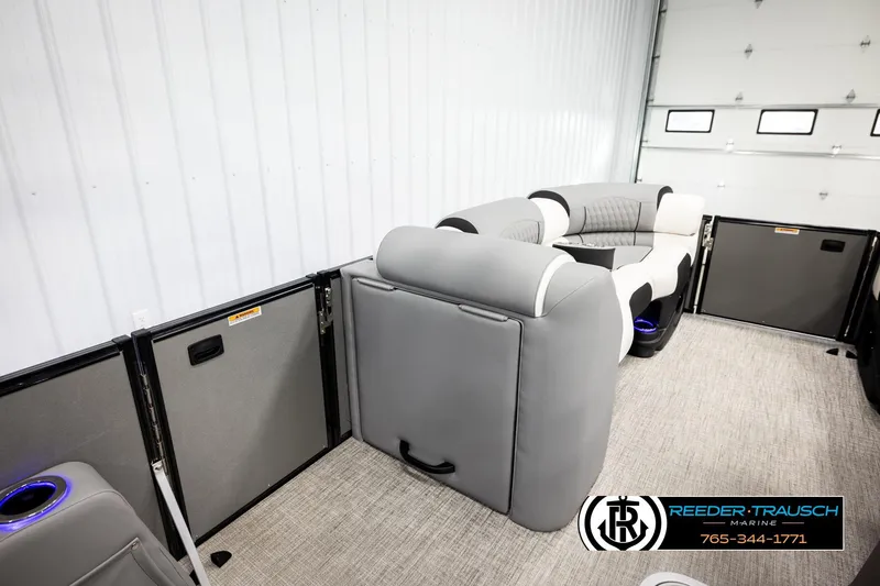Slide: The Image of Luxurious interior of 2026 Avalon CAT QLS pontoon boat with plush seating. - 31