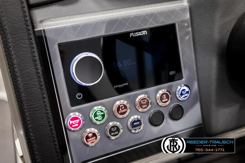 Slide: The Image of Control panel of 2026 Avalon CAT QLS boat with Fusion audio system and various function buttons. - 36