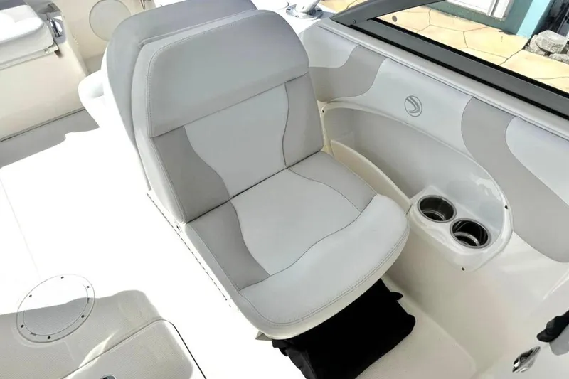Slide: The Image of 2016 Edgewater 205CX Crossover boat seat with cup holders, featuring sleek design and comfort. - 12