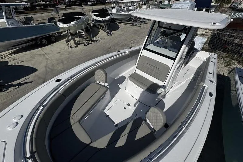 Slide: The Image of 2026 Sportsman Open 252 Center Console boat with spacious seating and modern design. - 8