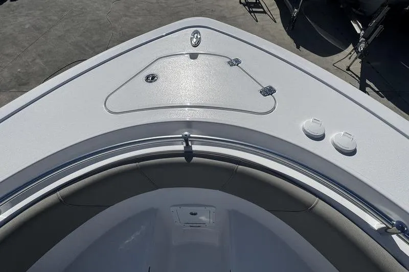 Slide: The Image of 2026 Sportsman Open 252 Center Console boat deck, featuring sleek design and storage compartments. - 9