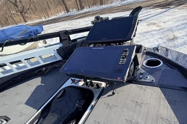 Slide: The Image of 2026 Vexus DVX22 boat dashboard with advanced navigation screens and controls. - 9