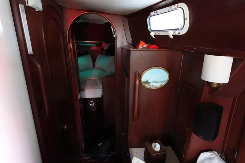 Slide: The Image of 1978 Morgan 382 yacht interior with wooden finish and cozy sleeping area. - 30