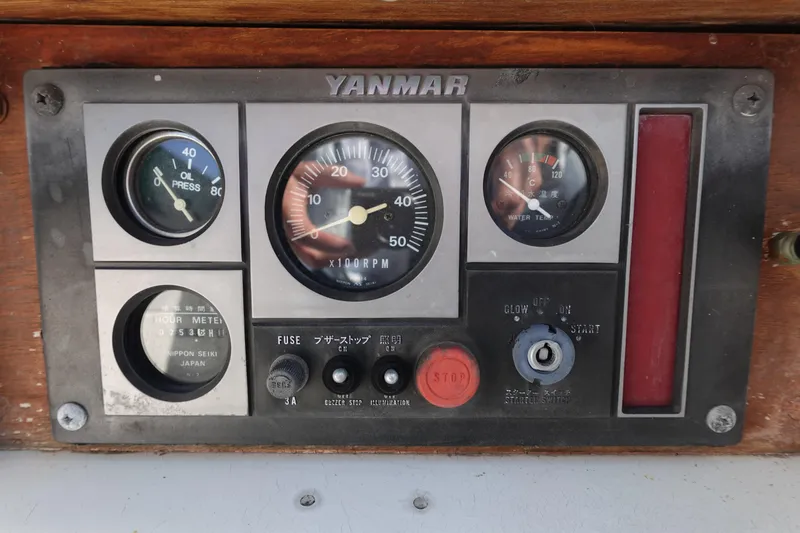 Slide: The Image of Control panel of a 1978 Morgan 382 sailboat with Yanmar engine gauges. - 77