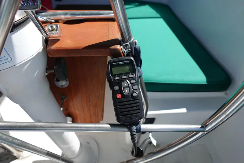 Slide: The Image of Cockpit of 1978 Morgan 382 sailboat with radio and green cushion. - 85