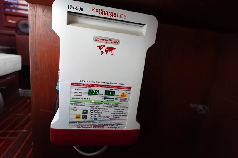 Slide: The Image of Sterling Power ProCharge Ultra battery charger in 1978 Morgan 382 sailboat interior. - 48