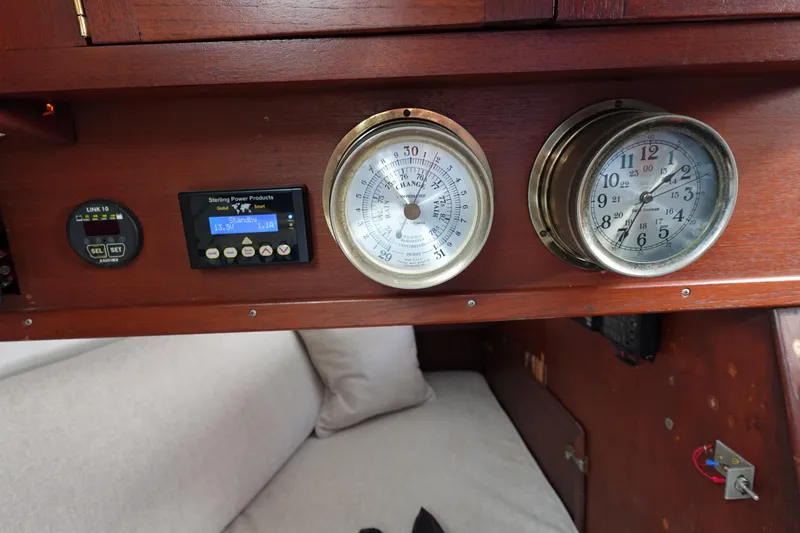Slide: The Image of 1978 Morgan 382 yacht interior with gauges and control panel on wooden dashboard. - 50