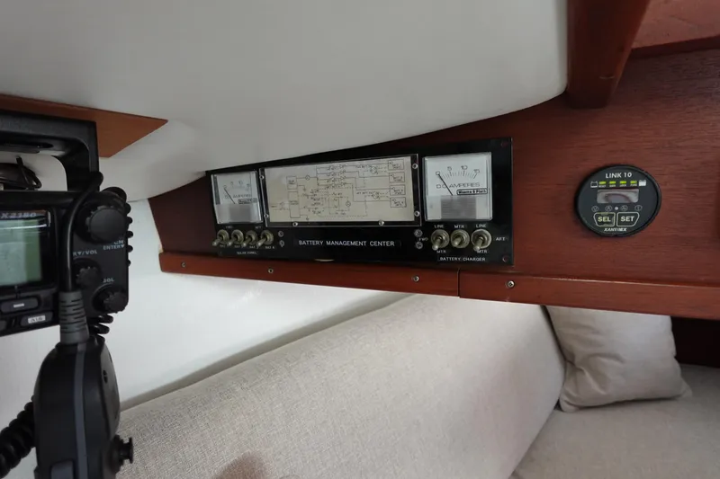 Slide: The Image of 1978 Morgan 382 yacht battery management center with control panel and gauges. - 51