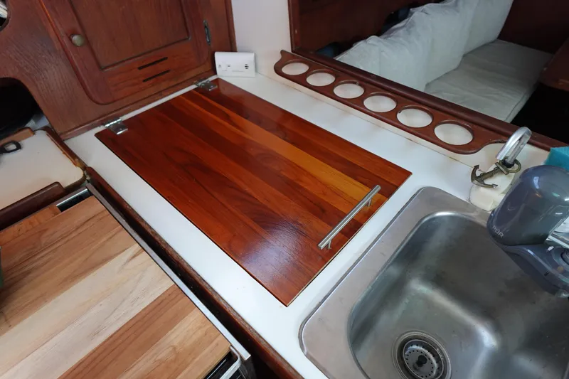 Slide: The Image of 1978 Morgan 382 yacht kitchen with wooden countertop and stainless steel sink. - 58