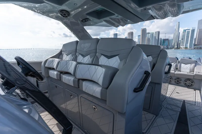 Slide: The Image of Luxurious interior of 2026 Deep Impact 499 Sport boat with city skyline view. - 26