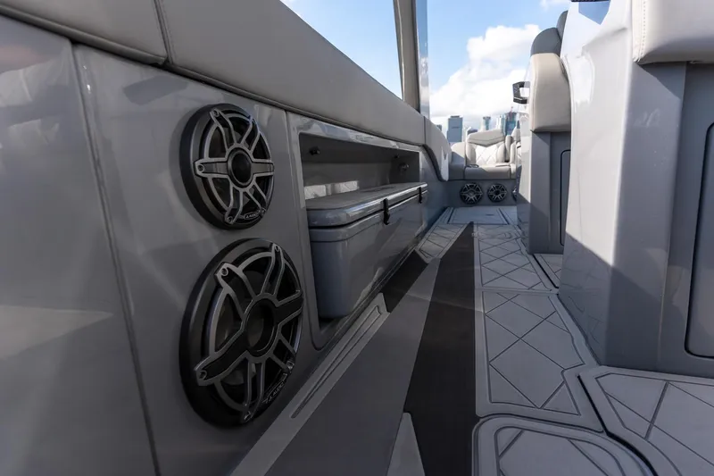 Slide: The Image of Interior view of 2026 Deep Impact 499 Sport boat, featuring sleek design and modern speakers. - 35