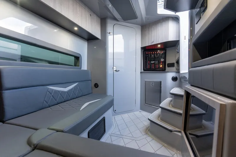 Slide: The Image of Interior of 2026 Deep Impact 499 Sport boat, featuring modern seating and sleek design. - 39