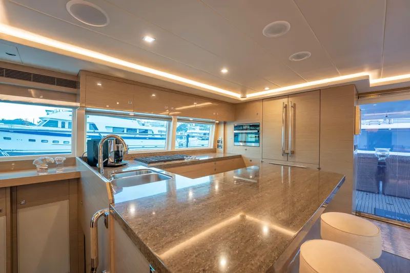 Slide: The Image of Luxurious yacht kitchen interior with modern appliances and large windows, Horizon 2021 model. - 10