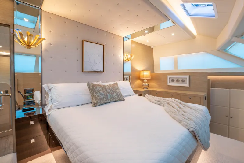 Slide: The Image of Luxurious yacht bedroom with elegant decor, plush bedding, and ambient lighting, Horizon 2021 model. - 14