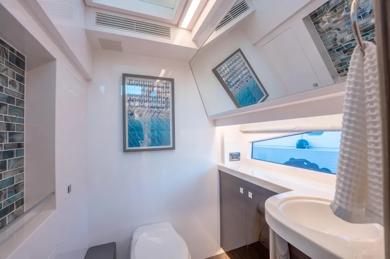 Slide: The Image of Luxurious Horizon yacht bathroom, modern design, large mirror, elegant fixtures, 2021 model. - 23
