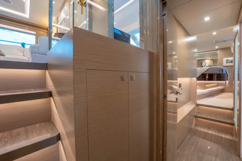 Slide: The Image of Luxurious Horizon yacht interior with modern wood finishes and ambient lighting, 2021 model. - 25