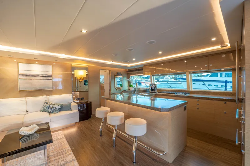Slide: The Image of Luxurious 2021 Horizon yacht interior with modern kitchen and elegant seating area. - 3