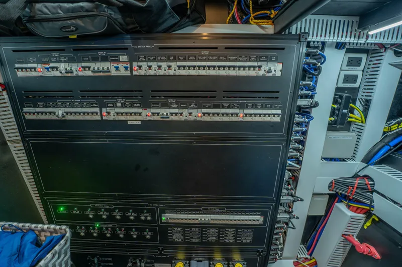 Slide: The Image of Electrical control panel with switches and wiring, Horizon 2021 model, in a technical setup. - 38