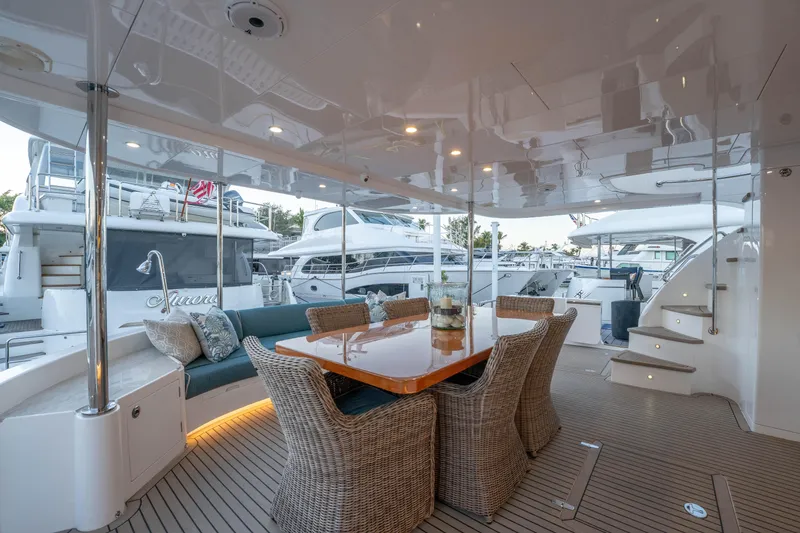 Slide: The Image of Luxurious 2021 Horizon yacht deck with elegant seating and dining area. - 50