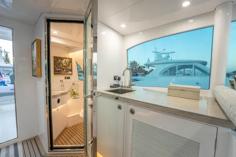Slide: The Image of Luxurious Horizon yacht interior with modern bathroom and sleek kitchenette, 2021 model. - 55