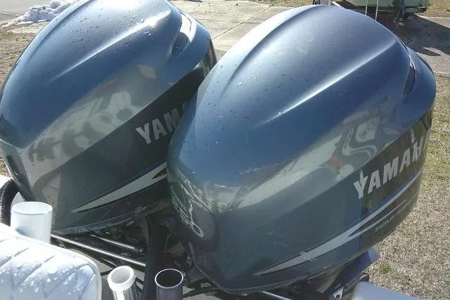 Slide: The Image of Twin Yamaha outboard motors on a 1996 Fountain 31 Center Console boat. - 42