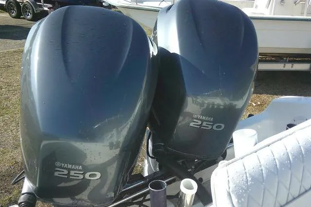Slide: The Image of Twin Yamaha 250 engines on a 1996 Fountain 31 Center Console boat. - 52