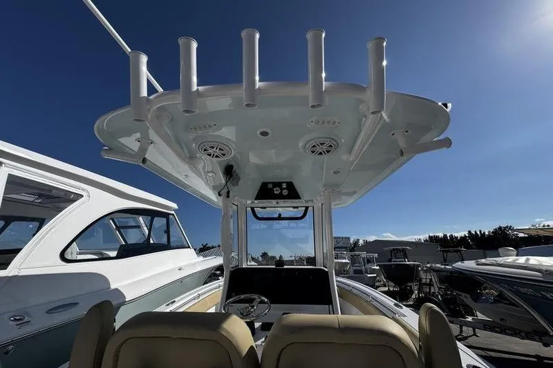 Slide: The Image of 2026 Sportsman Open 252 Center Console boat, featuring a sleek design and modern amenities. - 29