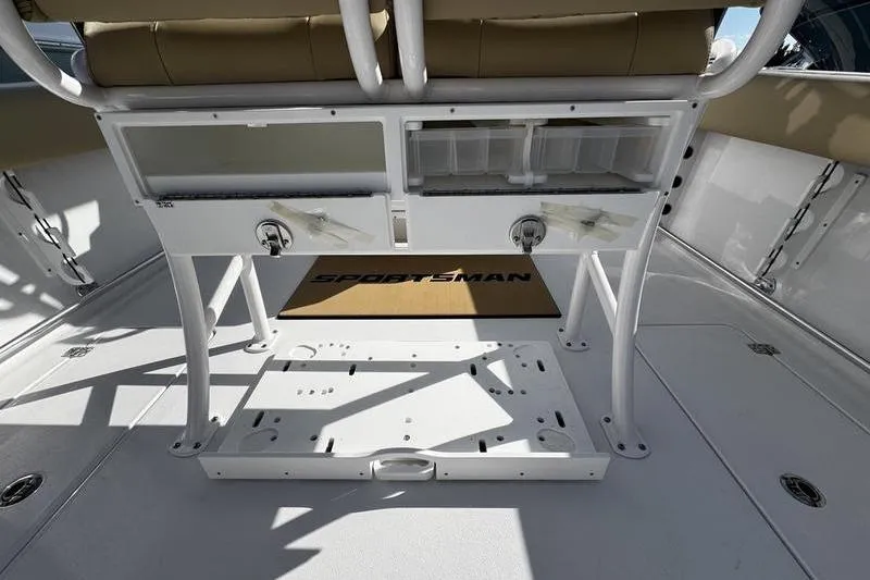 Slide: The Image of 2026 Sportsman Open 252 Center Console boat interior with storage compartments. - 30