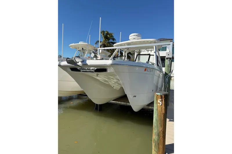 The Image of 2025 World Cat 260 DC-X boat docked, featuring sleek design and modern amenities. - 0