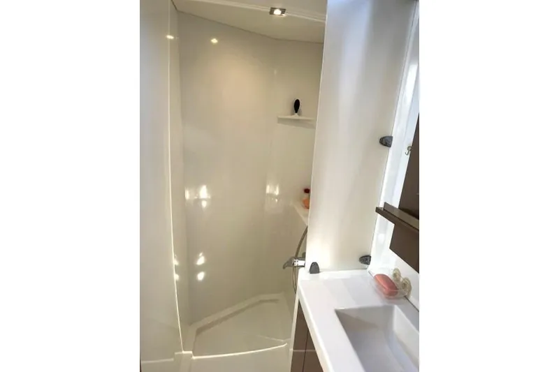 Slide: The Image of Bathroom interior of 2016 Fountaine Pajot Lucia 40 catamaran, featuring modern fixtures. - 12