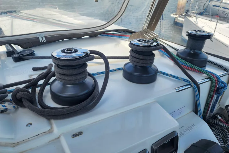 Slide: The Image of Helm of 2016 Fountaine Pajot Lucia 40 catamaran with navigation equipment and steering wheel. - 22