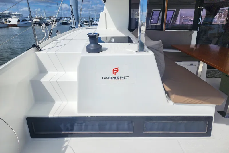 Slide: The Image of Close-up of colorful ropes and cleats on a 2016 Fountaine Pajot Lucia 40 catamaran. - 27